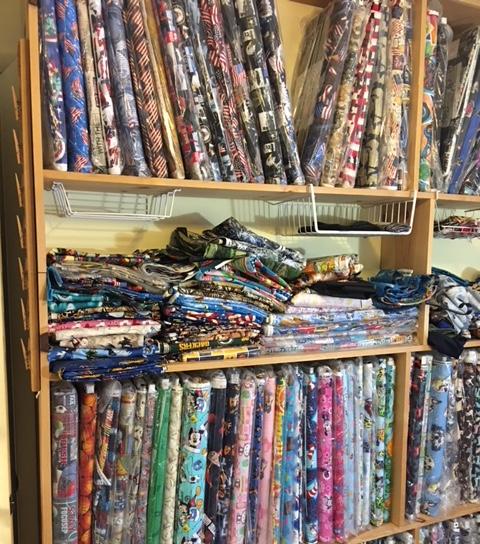 stacks of fabric for sale