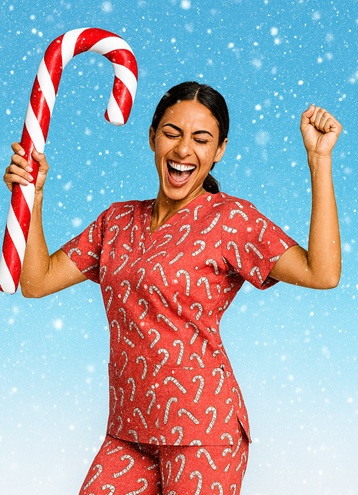 Christmas scrub top with red and white candy cane pattern, festive medical uniform for nurses, vet techs, and healthcare workers