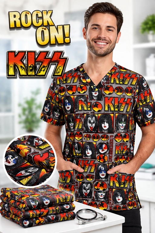 man wearing KISS print scrub top standing at table promoting scrubs