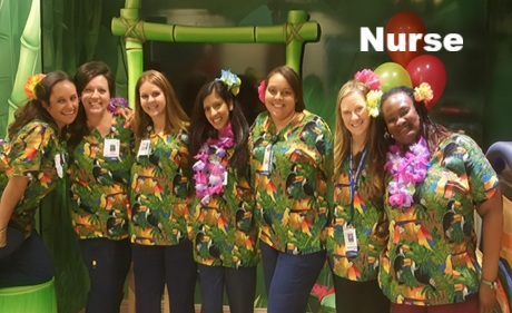 group of nurse posing with tropical parrot print scrubs