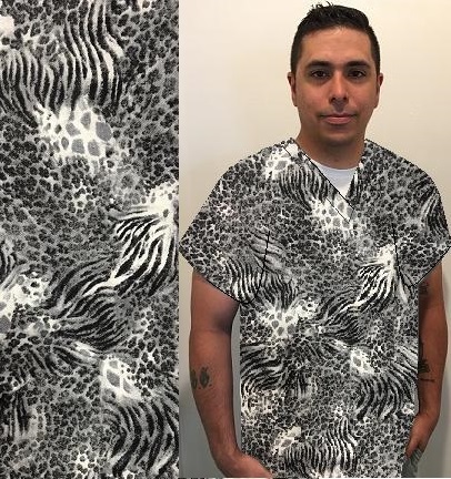 handsome man wearing a vet tech cotton print scrub top