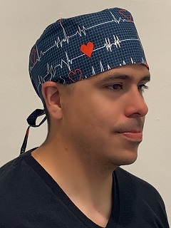 Man in a custom heart scrub cap